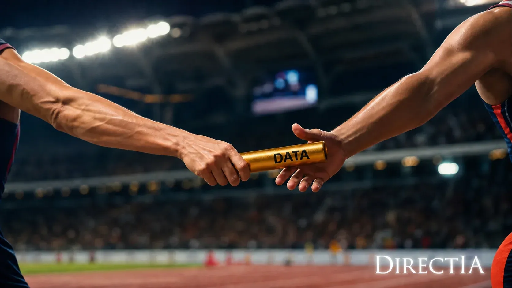 Deux athlètes se transmettent un témoin doré portant l’inscription « DATA » dans un stade.